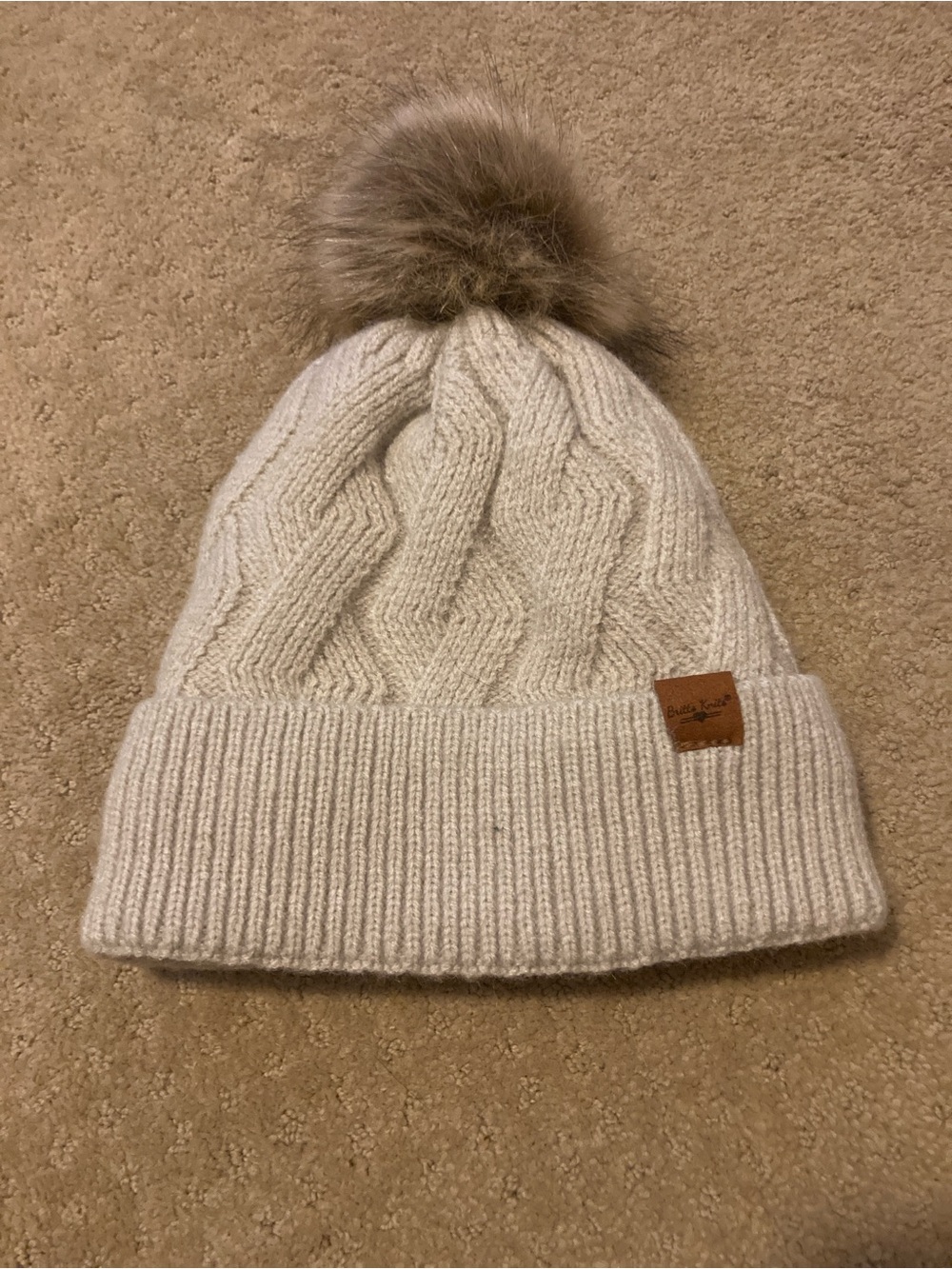 Britt’s Knits Cream Cable-Knit Pom Beanie with Faux Fur Pom